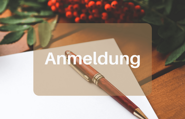 Blatt und Stift, Aufschrift: Anmeldung